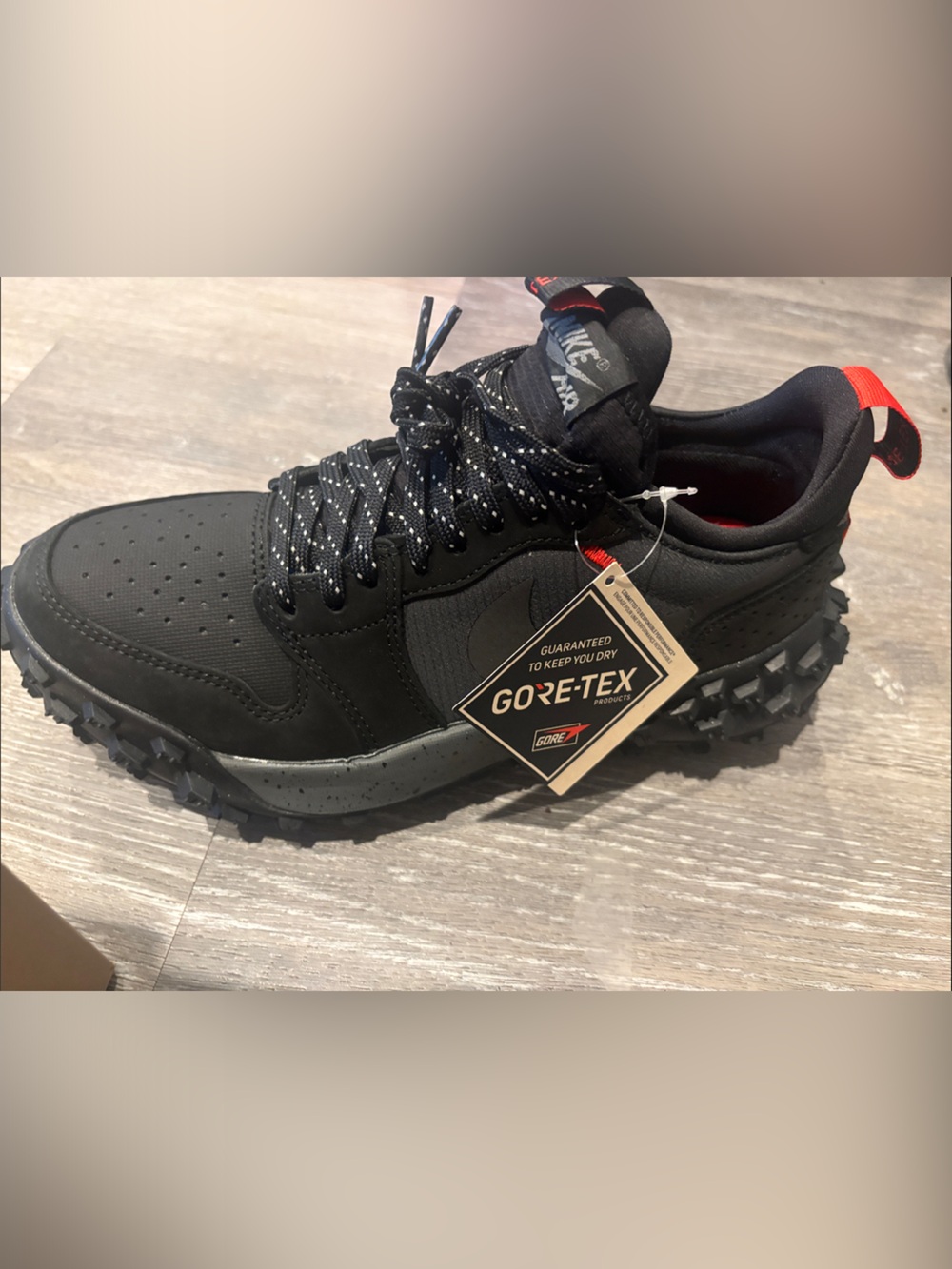 Nike Men's Black Trail Sneaker with Red Heel Tab